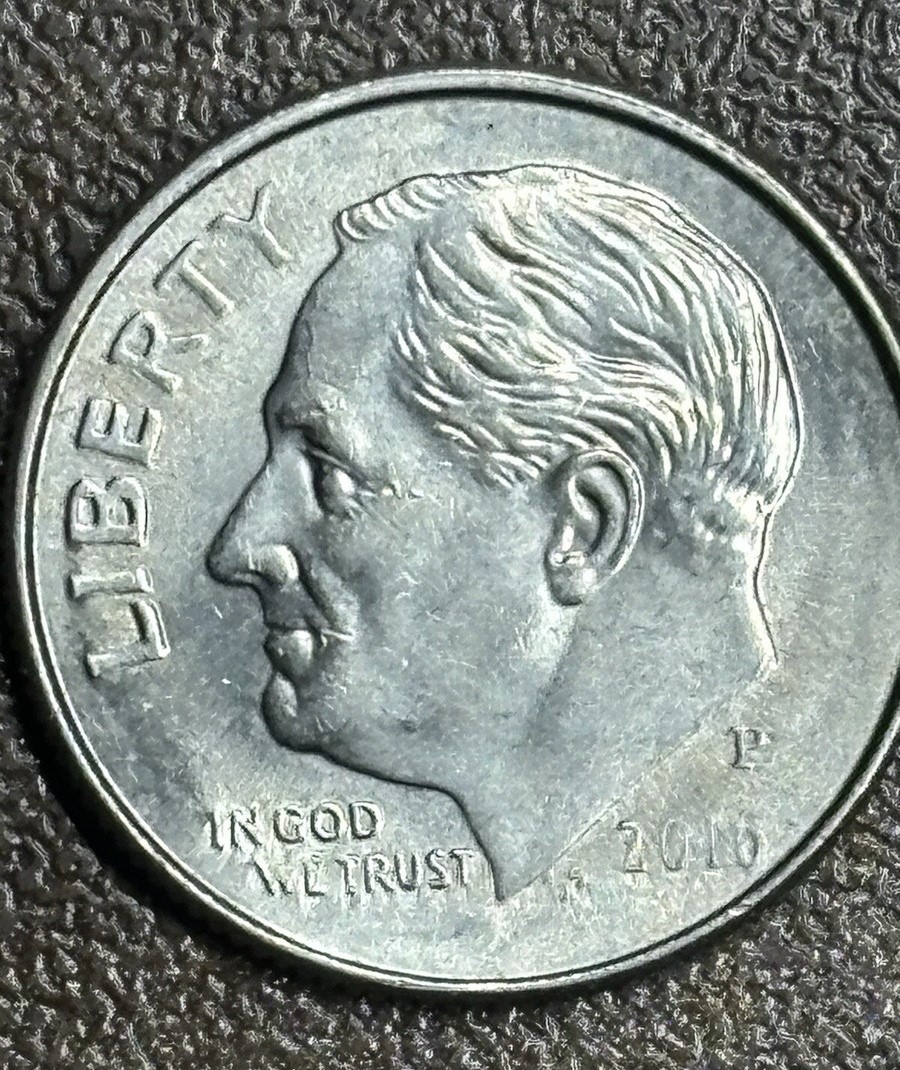 2016-D Roosevelt dime feeder finger scratch error showing parallel pressed-in lines